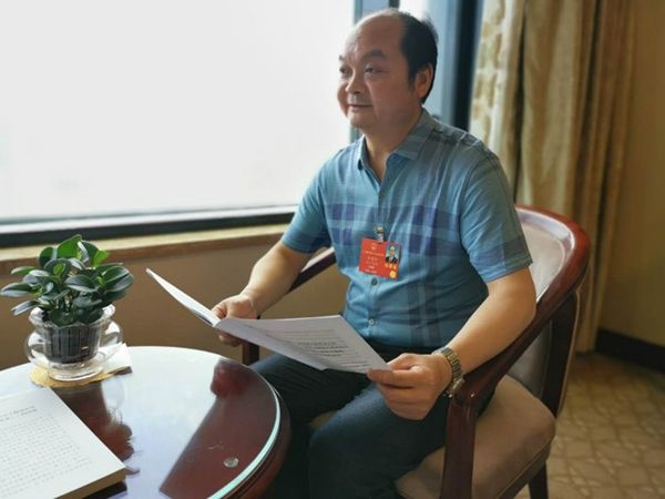 全国人大代表,资阳市副市长刘廷安:公摊面积多花"冤枉钱" 建议公摊与